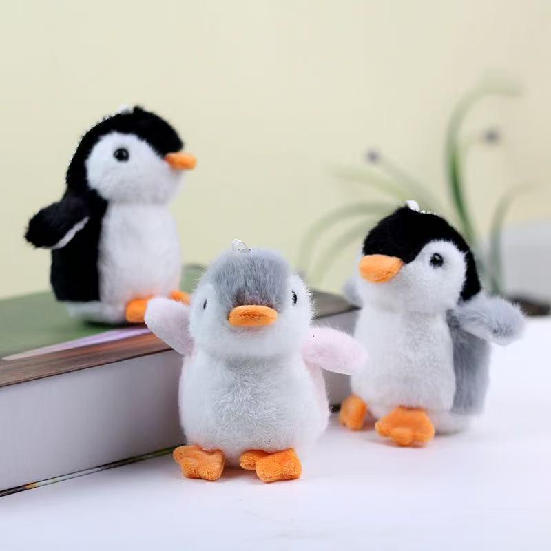 Adorable Penguin Plush Keychain Charm - Companion Cartoon Claw Machine Figure and Bag Accessory.
