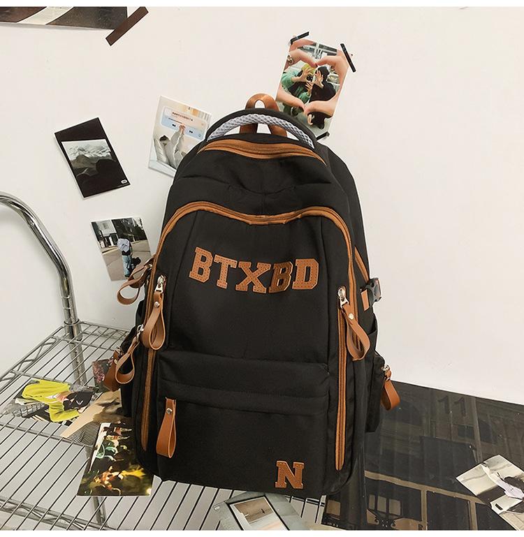 Large-capacity multi-layer schoolbag, junior high school students, girls, boys, high school students, load reduction ridge protection