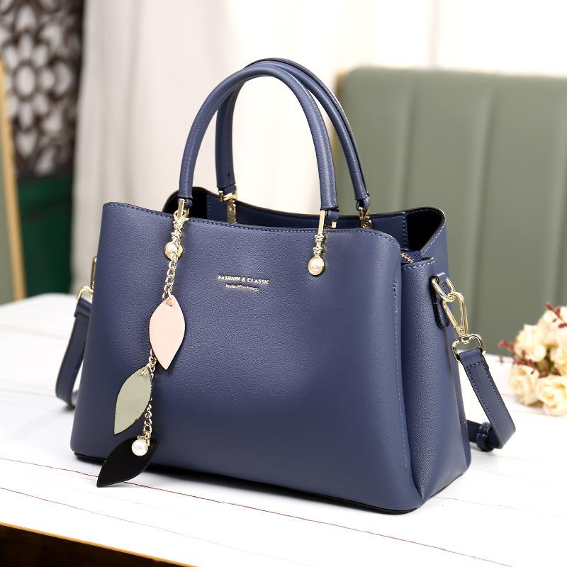 Leather Women's Bag New Crossbody Light Luxury One Shoulder Diagonal Strap Portable Commuter High-end Leather Mother Bag