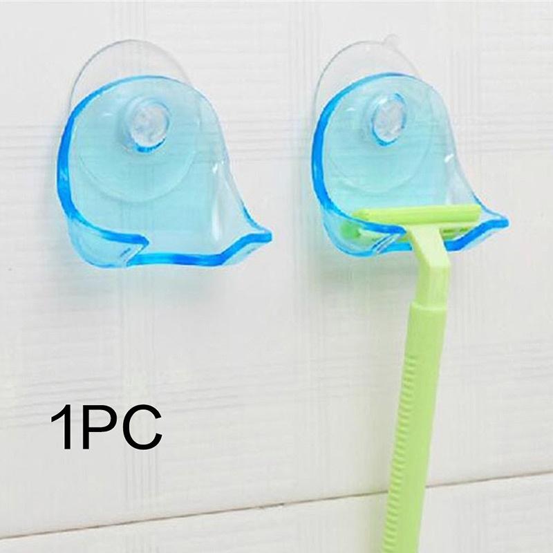 1 soporte para maquinilla de afeitar azul para baño, con ventosa.