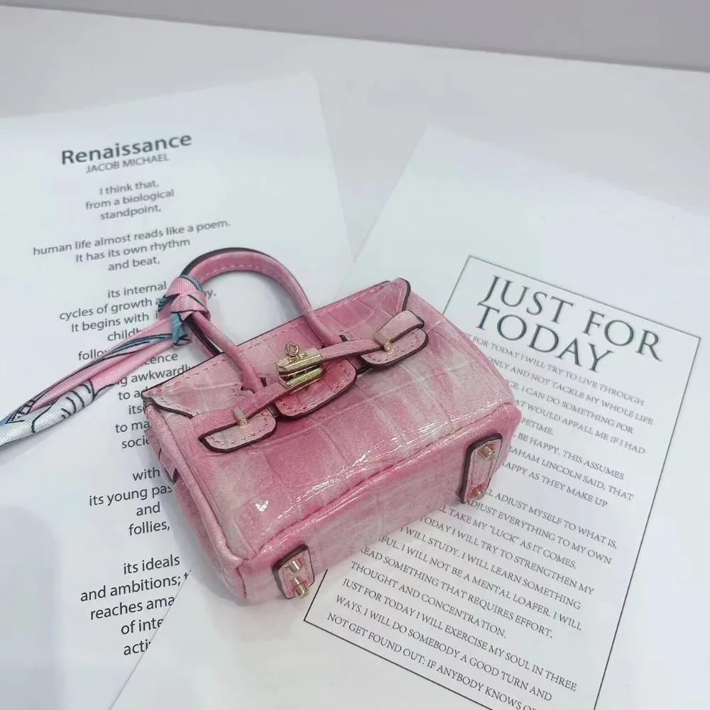 

New Fashion Mini Fragrant Cute Platinum Crocodile Pattern Earphone Bag Storage Pendant Creative Ornament Bag Pendant розовый