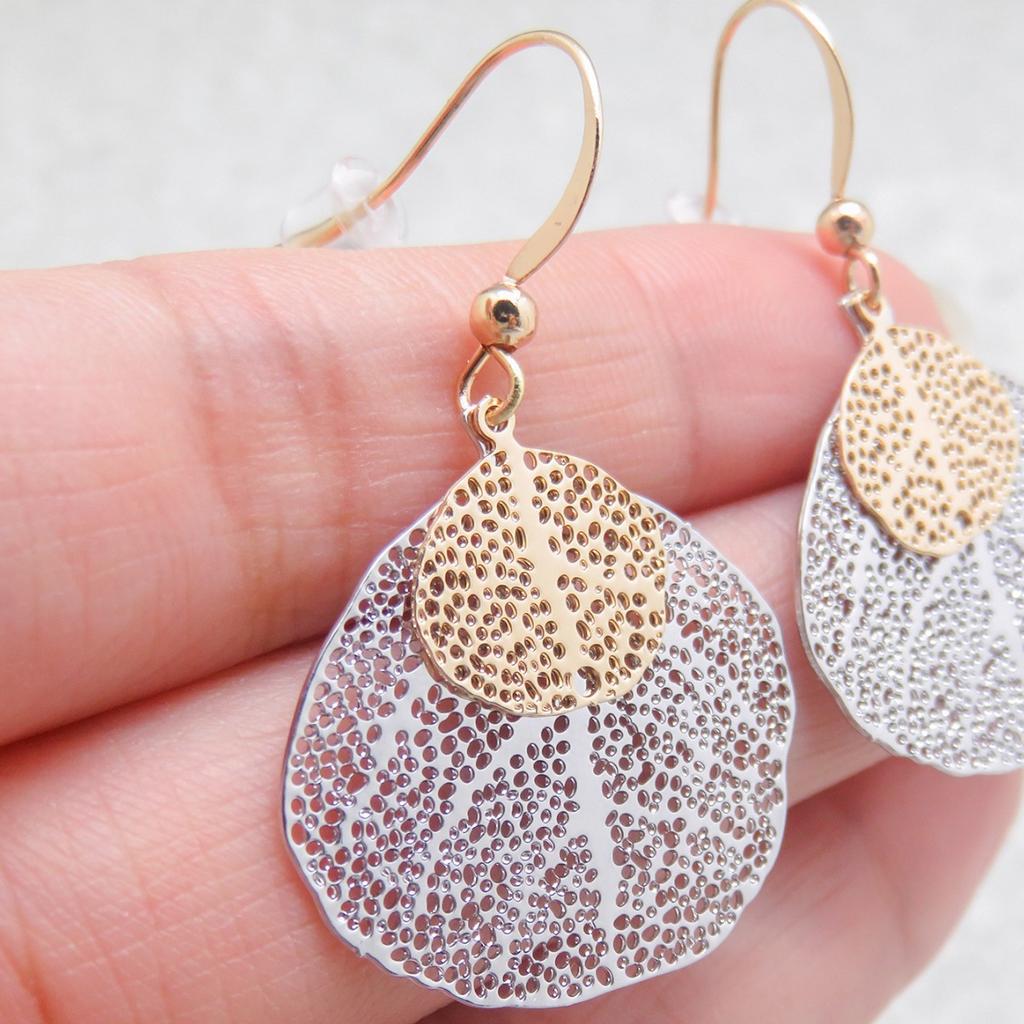 South Korea Dongdaemun Personalized Double Leaf Hollow Earrings Super Fairy Temperament Women's Stud Earrings Goddess High-end