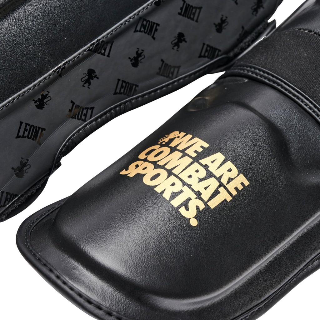 LEONE 1947 Bojové sporty Kickbox MMA Chrániče holení Unisex FULL chrániče nohou s EVA gelovými vložkami M PT177 [DNA PROTECTION] & Velikost/Černá [Originální]