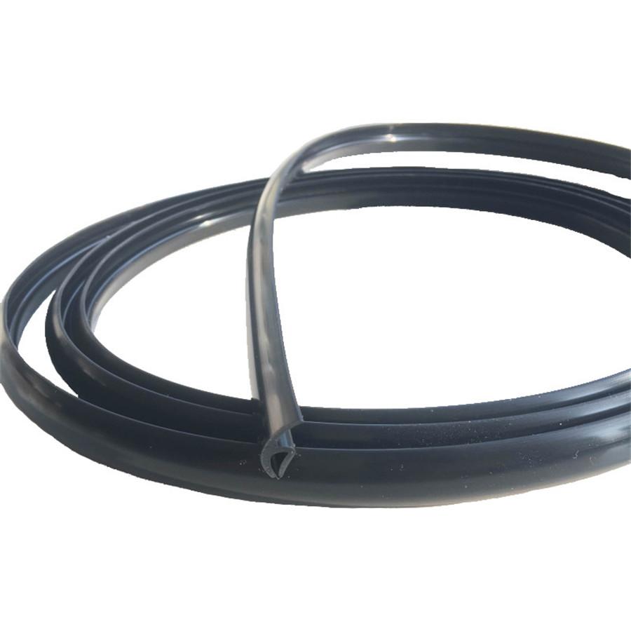 Mounted on the Plastic Panel Under the Windshield Wiper