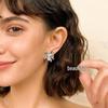 Blumen-Ohrstecker aus flüssigem Metall mit Zirkonia – Übertrieben, Hochwertiger, Vielseitiger Schmuck für Damen