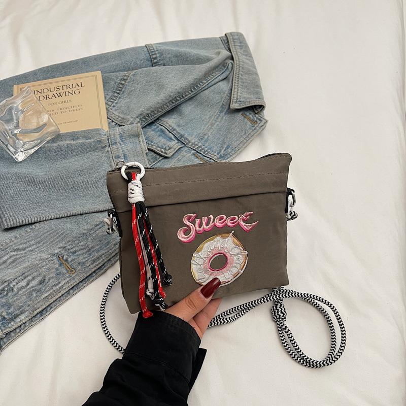 

Donut embroidery craft bag women s fashion shoulder messenger bag lightweight versatile commuter mobile phone bag серый