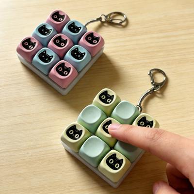 9-Tasten Schwarze Katze Fidget-Tastatur Stressabbau-Tastatur Finger-Klicker Schlüsselanhänger Büro Schule Reise Dekompressionsknopf Sensorisches Spielzeug