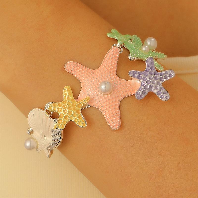 European and American star shell long necklace women's versatile high-end sense inlaid pearl drip oil collarbone chain necklace