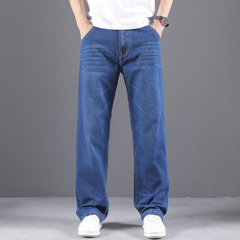 Premium men's denim trousers: relaxed straight-leg, lightweight summer style with no stretch, wide-leg cut, plus sizes available.