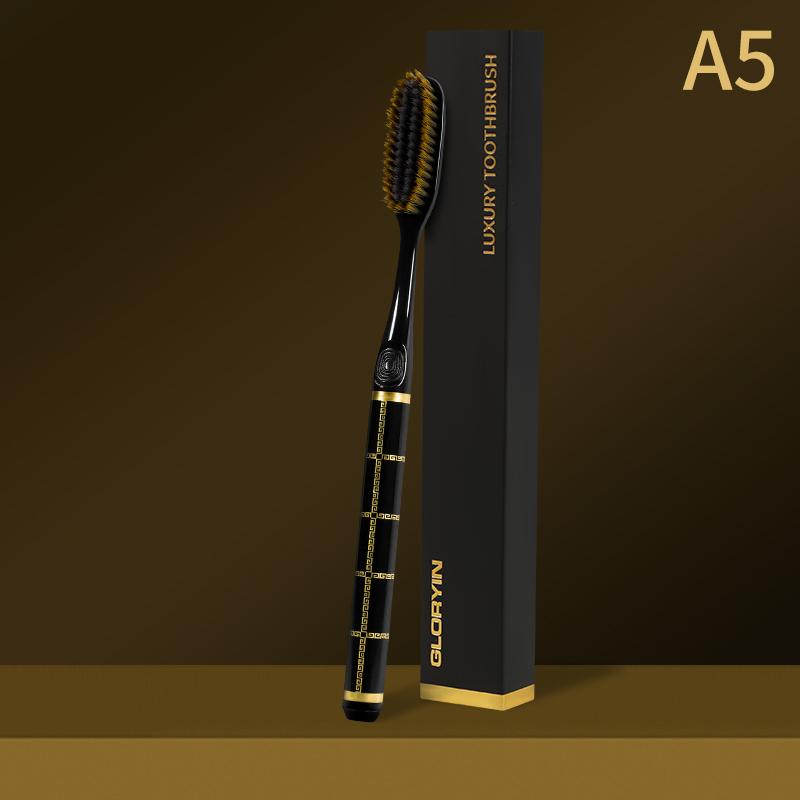 

GYN [individually boxed] new black gold printed handle extended brush head efficient cleaning soft bristle toothbrush