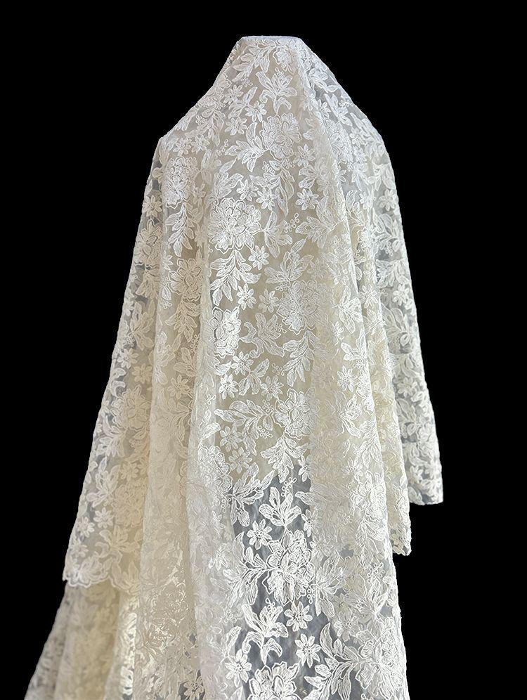 Light and delicate flower embroidery lace jacquard fabric suitable for wedding dresses formal gown and designer clothing fabrics
