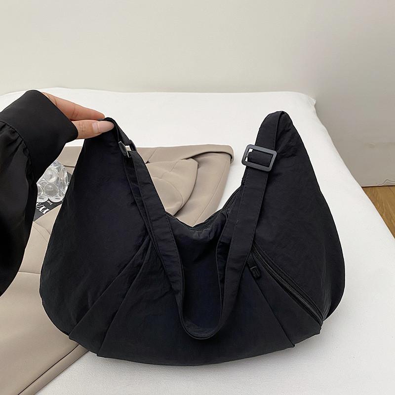 Bolso cruzado de nailon estilo callejero con cierre de cremallera para uso diario