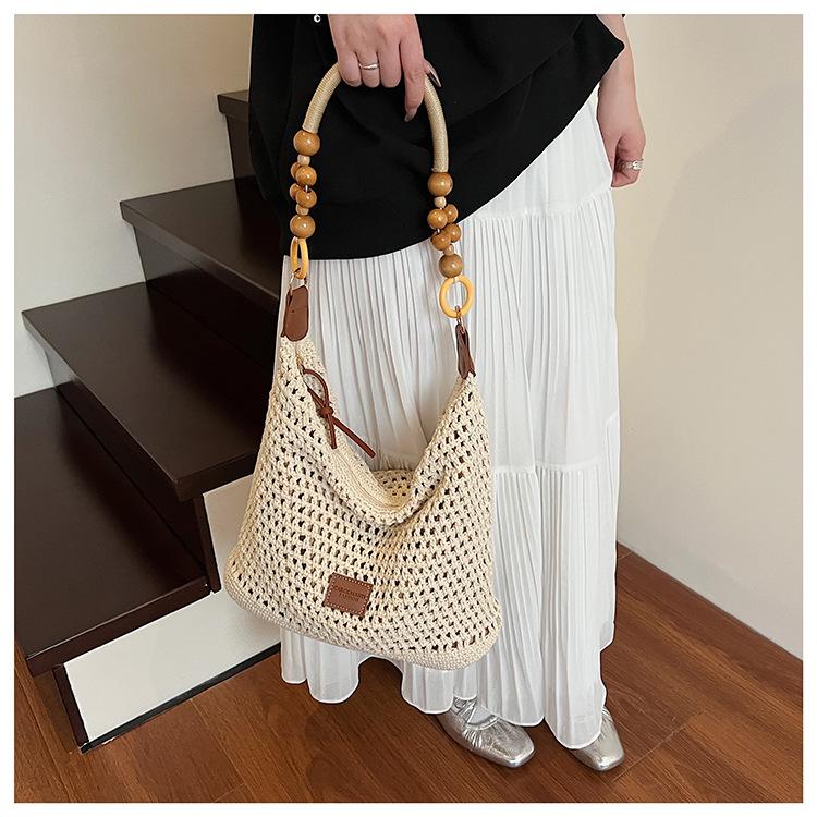 Holiday Style Woven Bag Women's New Knitted Hollow Shoulder Bag Fashionable Large-capacity Messenger Bag Beach Bag