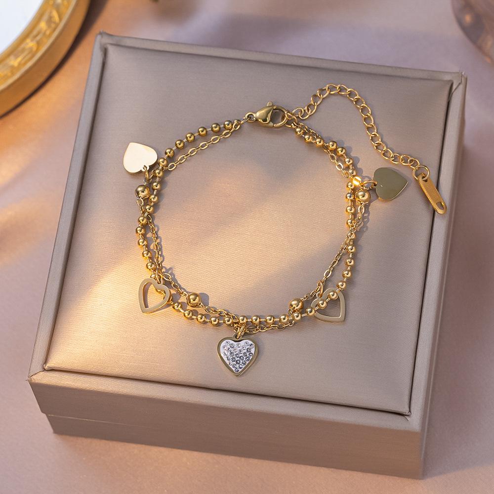 Elegant 18K Gold Titanium Steel Bracelets: European & American Fashion, Non-fading, Women's Versatile Personality Hand Jewelry