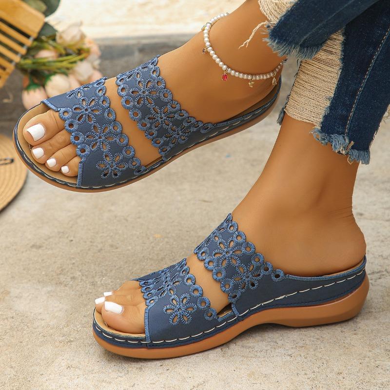 Thick-bottomed one-word slippers women's hollowed-out casual flowers large-size new slope heel cool slippers women's summer