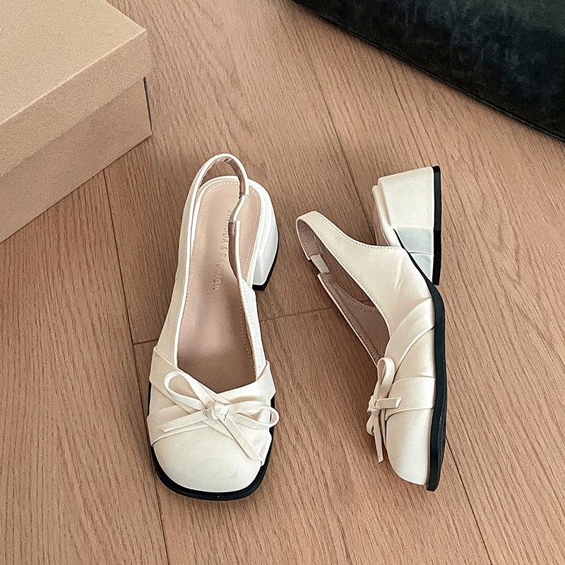 French temperament women's single shoes bow hollow bag head sandals 2025 spring new gentle and sweet back empty low heels