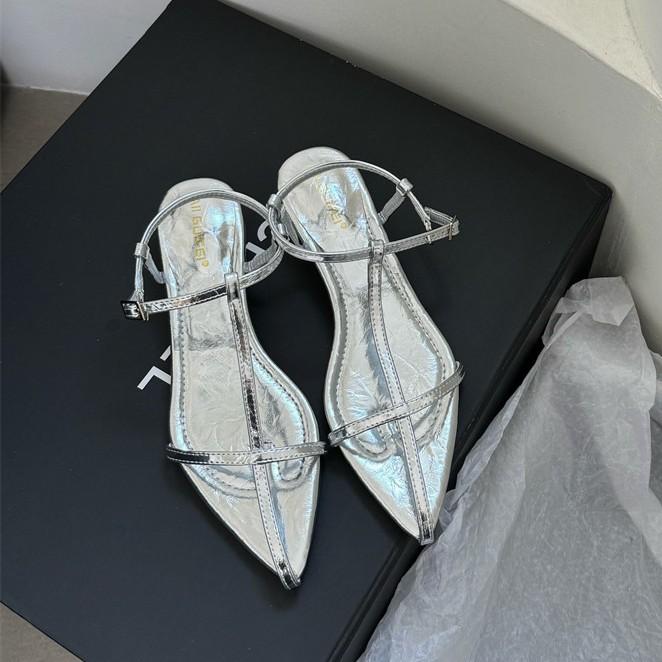 2025 spring and summer Korean version pointed-toed flat-bottomed women's Korean wave heel cross buckle Roman women's shoes design sense sandals women'