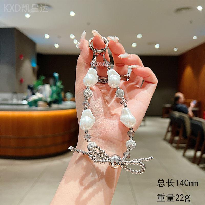

Full Diamond Heart Butterfly Knot Bracelet Phone Strap for Women, Light Luxury Style Handmade Beaded Chain, Shiny Diamond Transparent Wristband Rhinestone Pearl Bow Hang