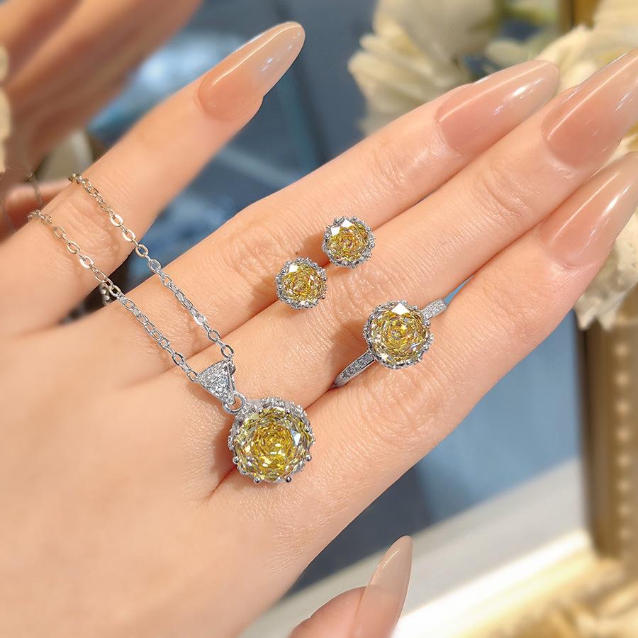 Octagonal Rose-Cut Tanzanite Pendant with High-Carbon Diamonds, Colorful Diamond Earrings, and Paraiba Ring