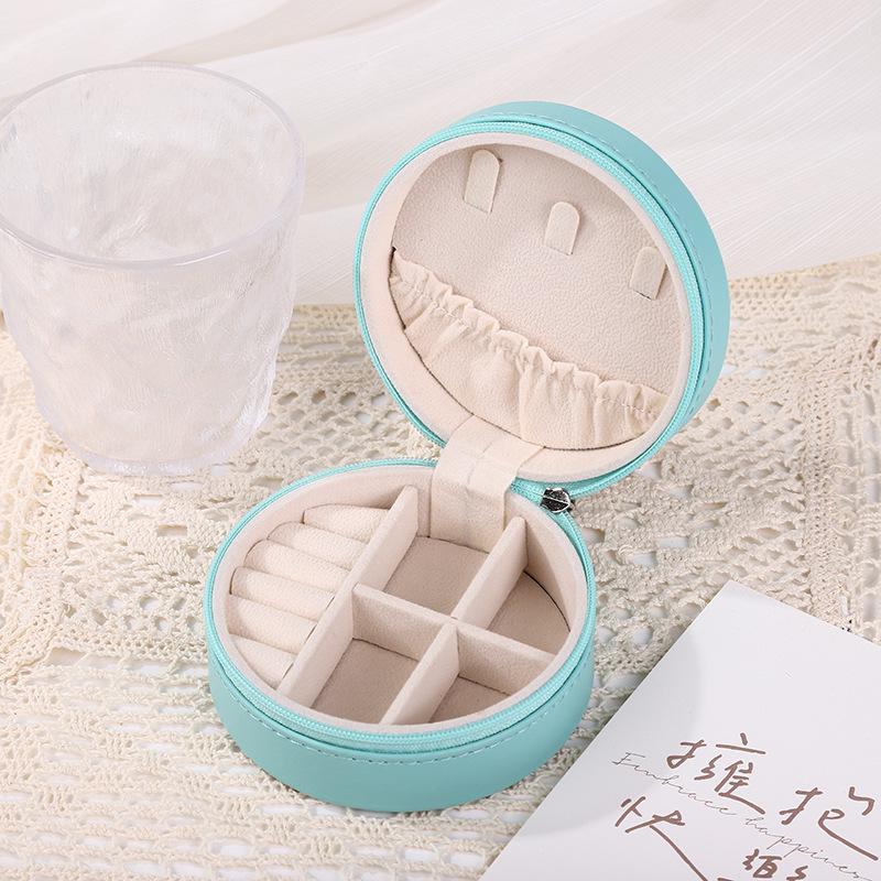 Round PU Jewelry Box: Portable Multi-functional Storage for Necklaces, Earrings, and Rings
