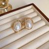 European and American metal wind hollow flower fishtail pearl earrings exaggerated temperament earrings heavy industry earrings
