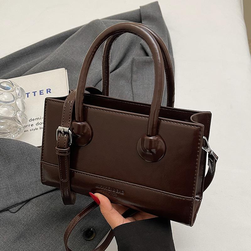 Wholesale Popular Niche Simple Temperament High Sense Portable Small Square Bag Women's Fashion Versatile Work Commuter Messenger Bag