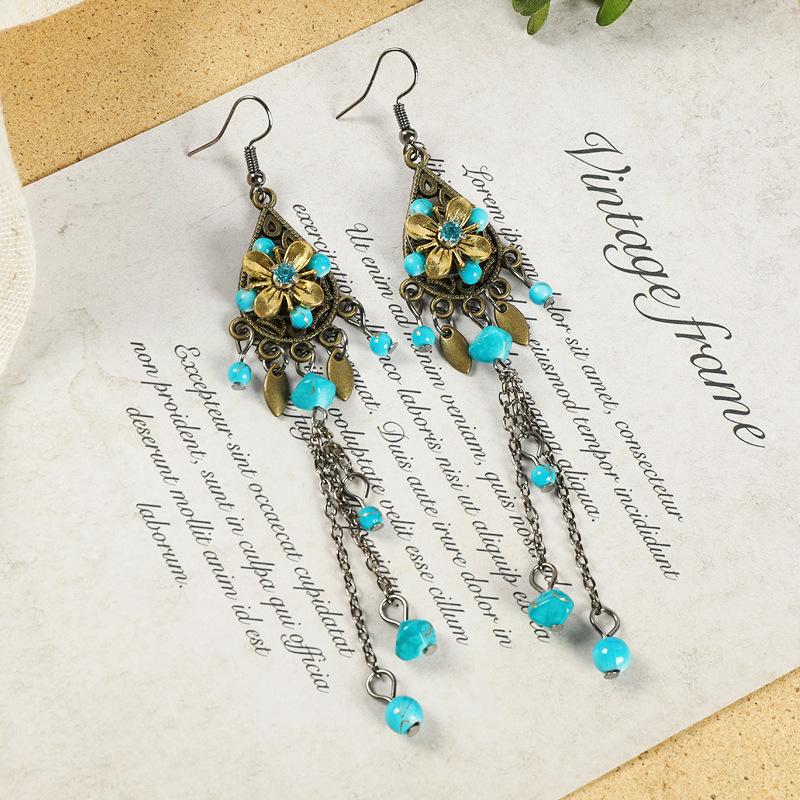 

Оригинальный дизайн ретро длинные серьги с бахромой из цветов женские универсальные темпераментные нишевые серьги