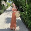 The Real Shot of the New Floral Vacation Dress Closes the Waist and Shows White and Orange Suspender Skirt.