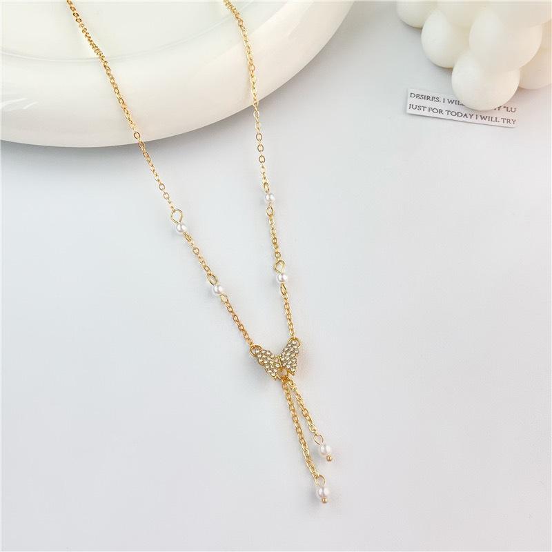 

2023 Pearl Butterfly Choker: Women s High-End Luxury Necklace with Zircon Clavicle Chain
