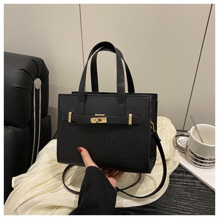 Stor kapacitet sommar vardaglig ny retro mode textur vardaglig bärbar tote crossbody axelväska kvinnor