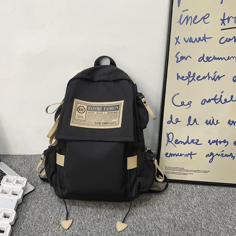 

This year s popular large-capacity backpack 2025 Korean version of campus backpack fashion summer campus backpack male trend чорний