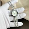 Elegante Damenarmbanduhr Blume Quarz-Armbanduhr Strass-Quarz-Uhr Business-Anlass