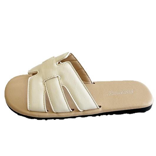 Fairy summer breeze with new slippers, female wearing beach skirt one-word flat sandals