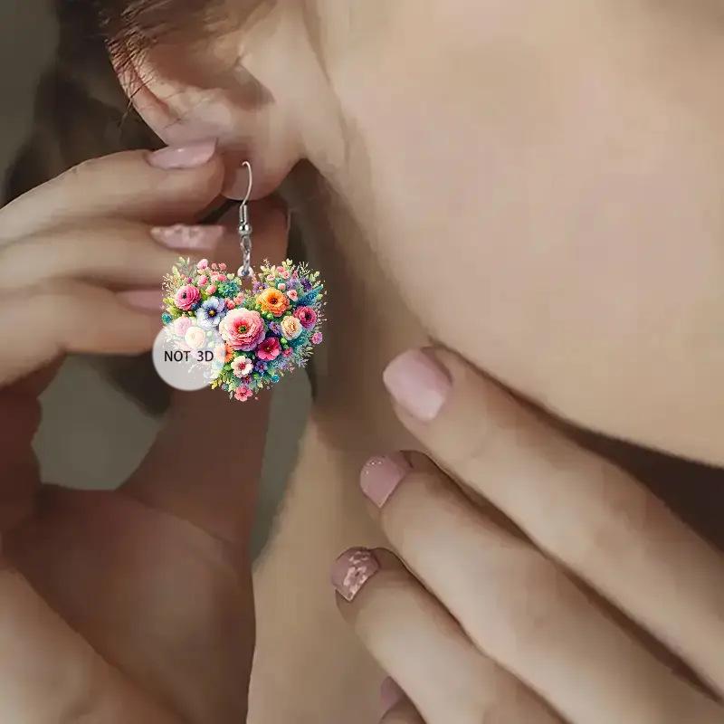 Brincos românticos de coração com flores