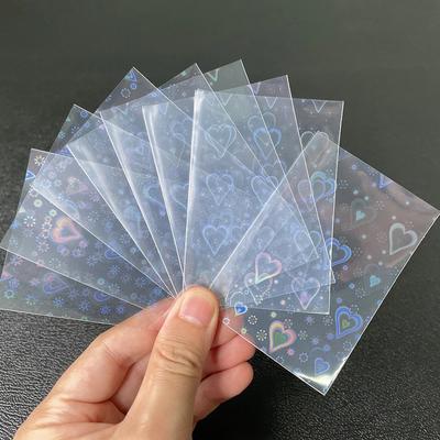Folia w kształcie serca Laserowe koszulki na karty 100 szt. Przezroczysta torba do przechowywania gier Tarota YGO Board Protector Karty kolekcjonerskie Tarcza