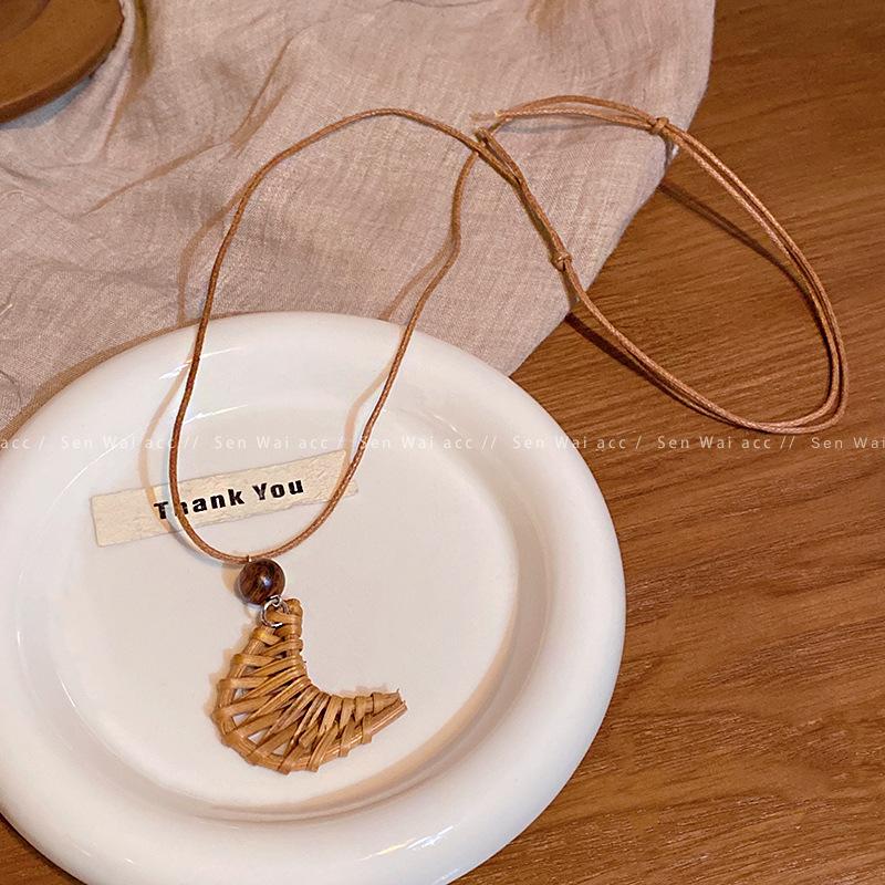 

Bohemian ethnic love moon woven necklace women s retro long pendant pendant accessories wholesale
