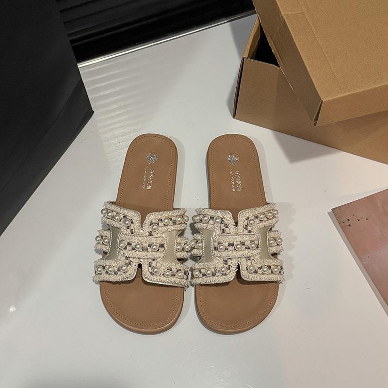 2025 summer new Xiaoxiangfeng flat-bottomed slippers women wear spring soft-bottomed fairy versatile pearl beach sandals