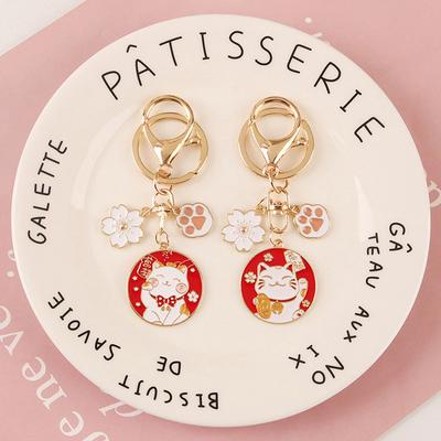 Niedlicher Glückskatzen-Schlüsselanhänger Maneki Neko Katze Haustier Pfote Sakura Original Schlüsselanhänger