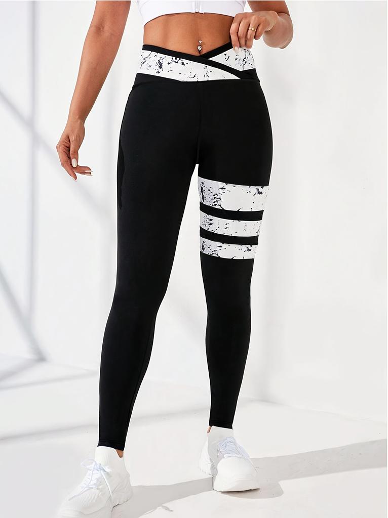 European and American women's clothing new cross-waist black and white contrasting colors casual yoga trousers high-waist hip-lifting elastic pants