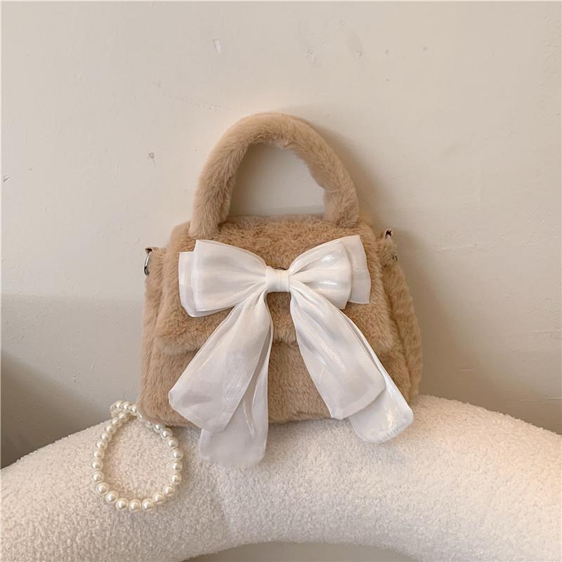 

Autumn and winter new temperament fashionable plush texture simple travel small square portable bow small bag female tide 23*16*7cm коричневый