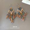 Retro Ethnic Windshield Fringed Ear Hook Exaggerated Personality Fashion Niche Earrings Light Luxury High-end Earrings
