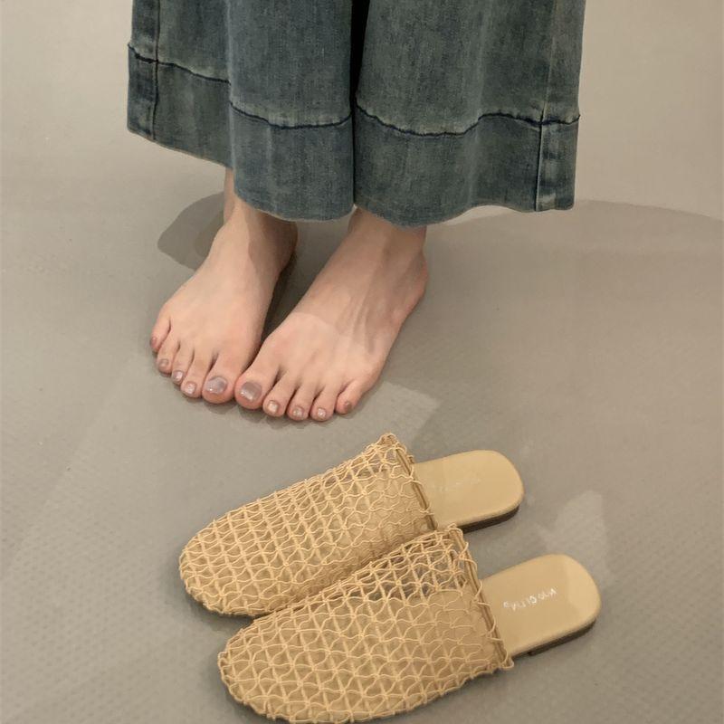 Retro neue Mesh hohle atmungsaktive kühle Hausschuhe Fischernetz gewebte Tasche Kopf halber Schlepp flache Muleschuhe Römersandalen