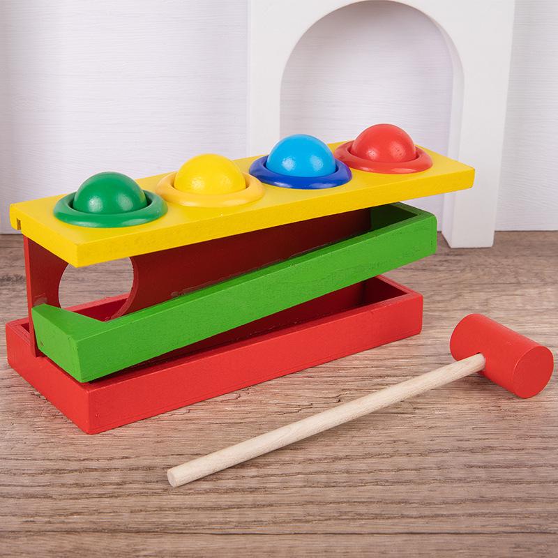 

Montessori Knock Ball Table: Four-Color Hammer Box Toy for Early Education