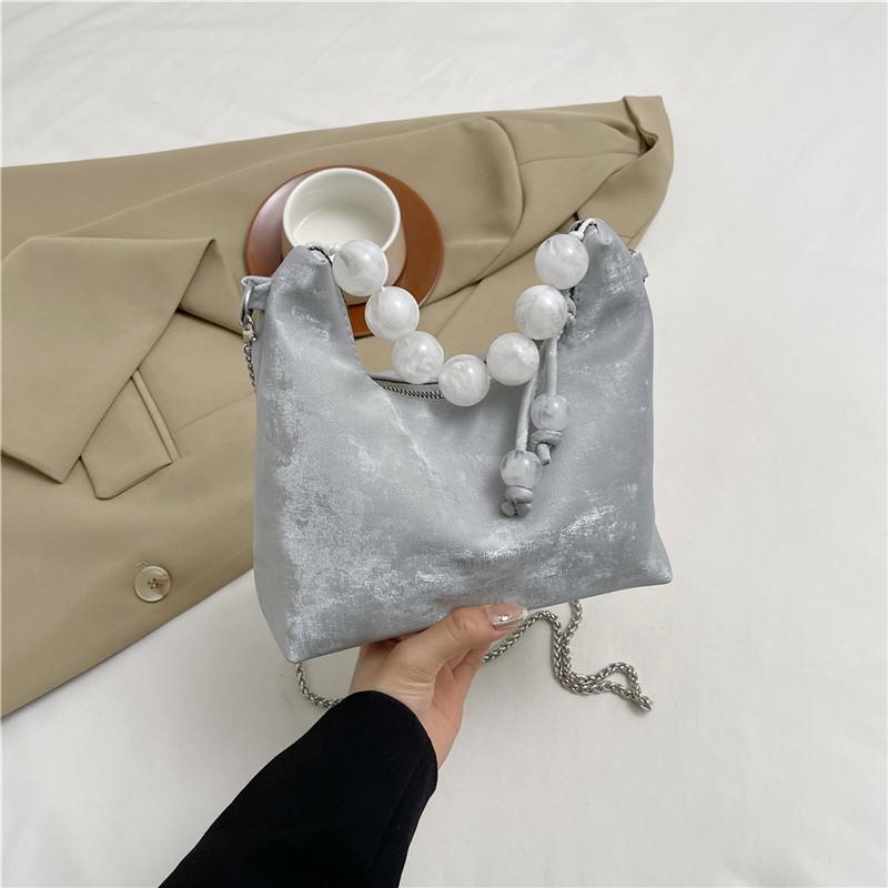 

Simple casual messenger bag retro trend crescent bag commuter bag 2024 summer new fashion trend shoulder bag срібний