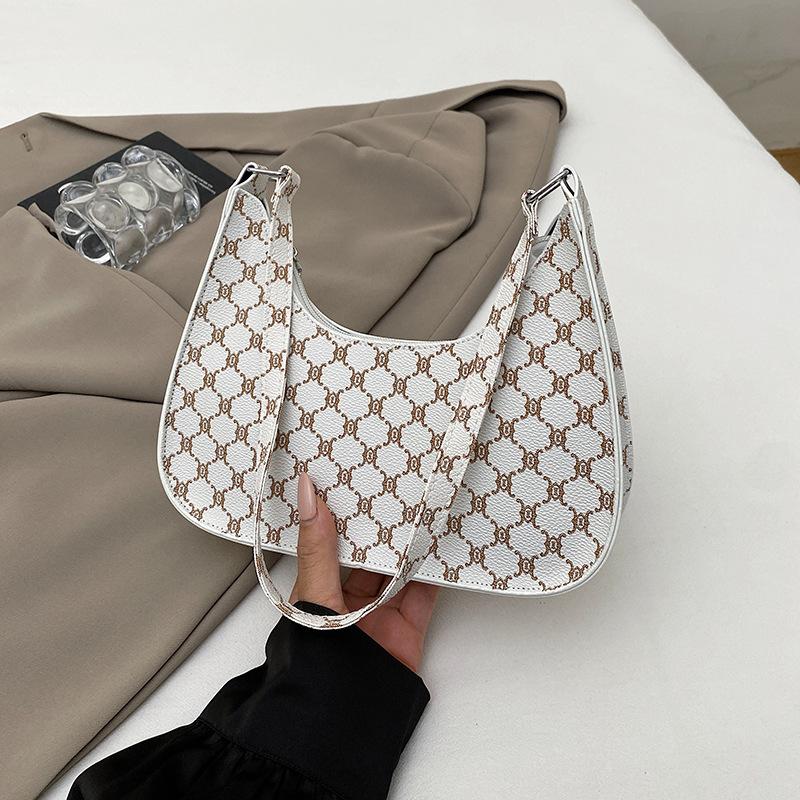 

New baguette small bag women s bag shoulder armpit bag texture versatile casual small cross bag tide белый