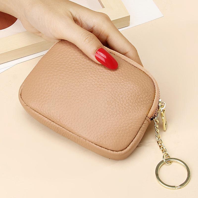 Mini-Geldbörse aus echtem Leder mit Reißverschluss für Damen, kompaktes Münzgeldbörse mit Schlüsselanhänger und stilvollem Design aus genarbtem Leder