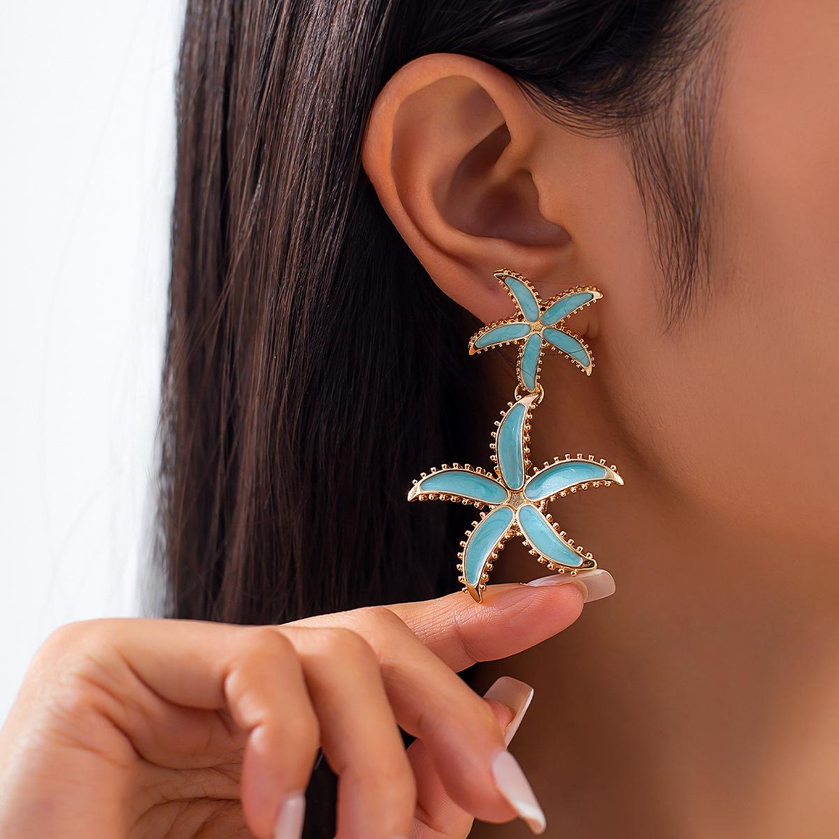 

Accessories, blue oil-dripping flower fringed earrings, niche personalized design sense, five-leaf flower stud earrings for women