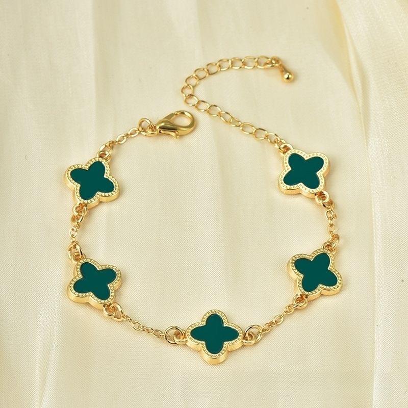 1PC women's lucky four-leaf clover multi-layer chain bracelet, elegant and simple white and black chain, the four-leaf clover symbolizes good fortune.