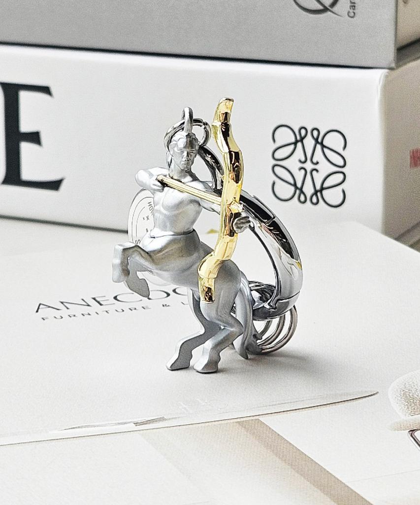 CHOCLI METALMORPHOSE COLLECTION Belgian Metal Keyring - Constellation Sagittarius