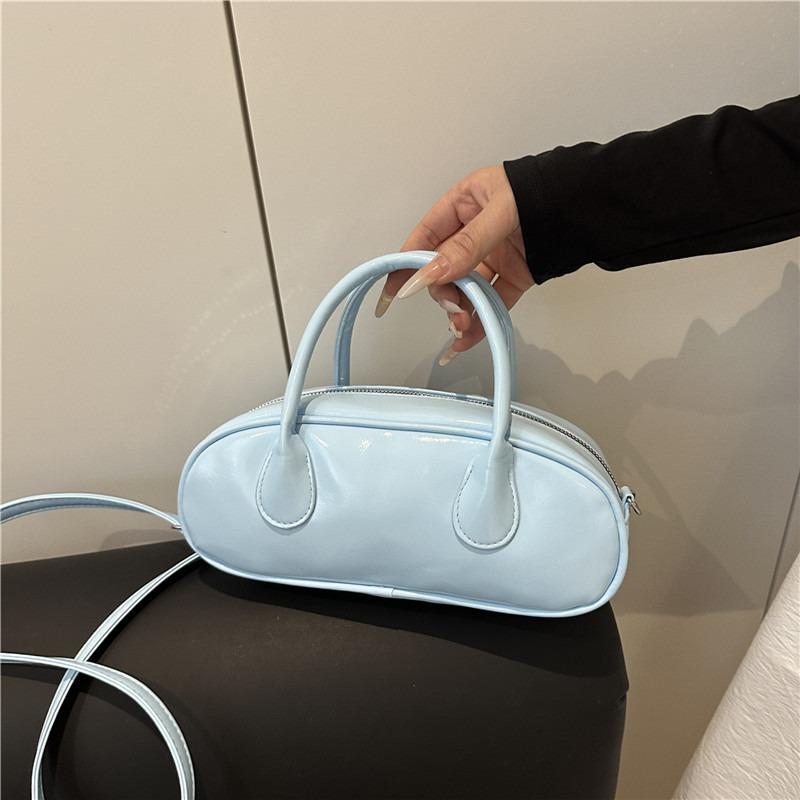 Niche design baguette bag portable small bowling bag shoulder messenger bag high sense